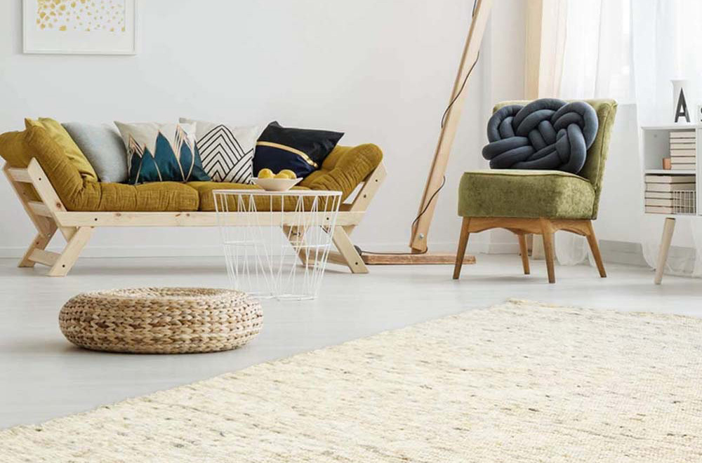 Een wollen vloerkleed geeft je kamer een natuurlijke uitstraling